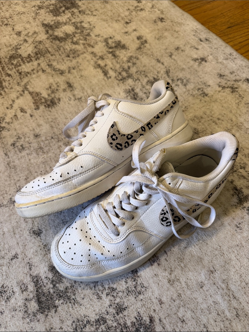 Nike White Low-Top Sneakers with Leopard Swoosh Accent